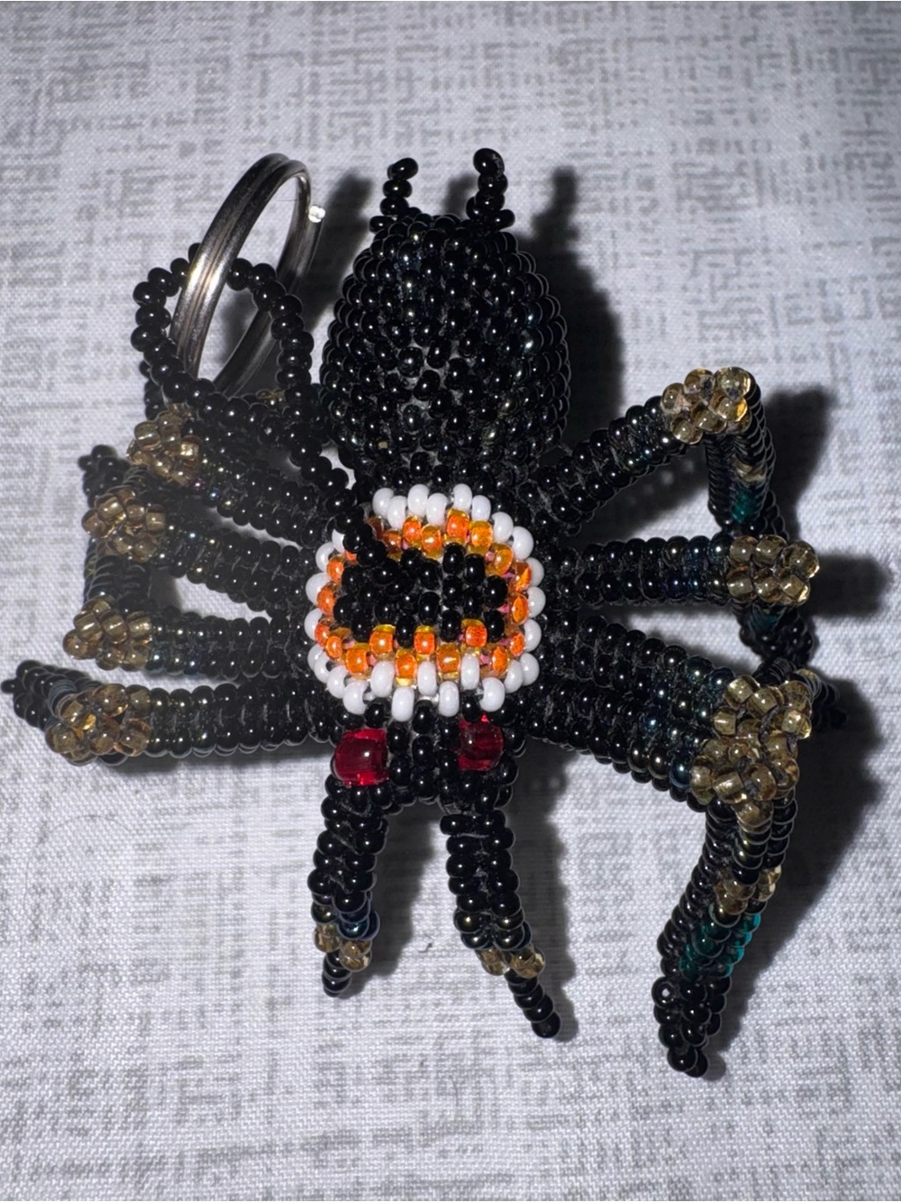 Handmade Beaded Spider Keychain - Black with Red, Orange & Gold Accents